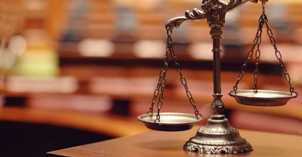 A metal scale tipped to the left.