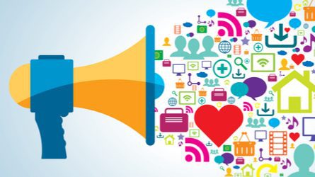 An illustration of a megaphone with several icons coming out of it - hearts, internet symbols, music notes, computers, etc. all indicating internet activity.