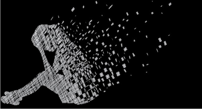 Silhouette of a person sitting head-in-hands, with pieces coming off the silhouette and disappearing into the air.