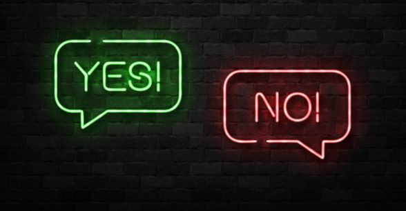 Two neon signs in the shape of speech bubbles. One says yes, one says no.