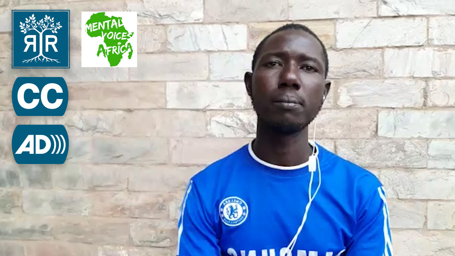 Rooted in Rights and Mental Voices Africa logo with Closed Caption and Audio Description logos. Nick sits in front of a brick wall.
