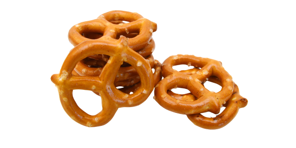 A pile of small, hard, baked salted pretzels.